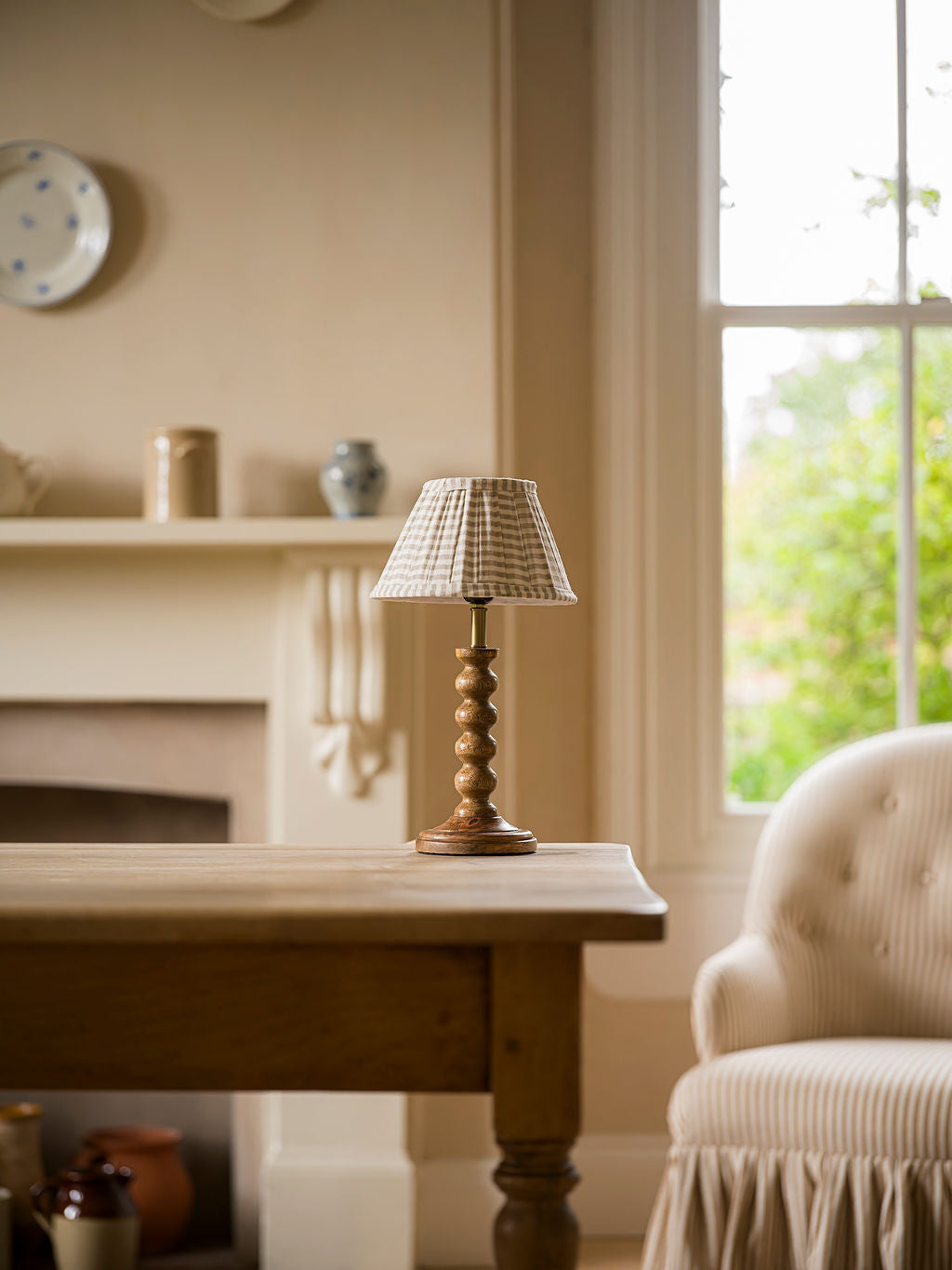 The Bobbin Table Lamp Natural with striped pleated shade