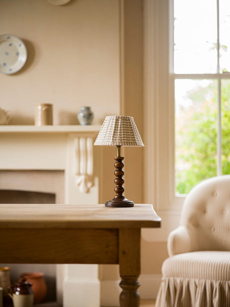 The Bobbin Table Lamp Walnut with striped pleated shade