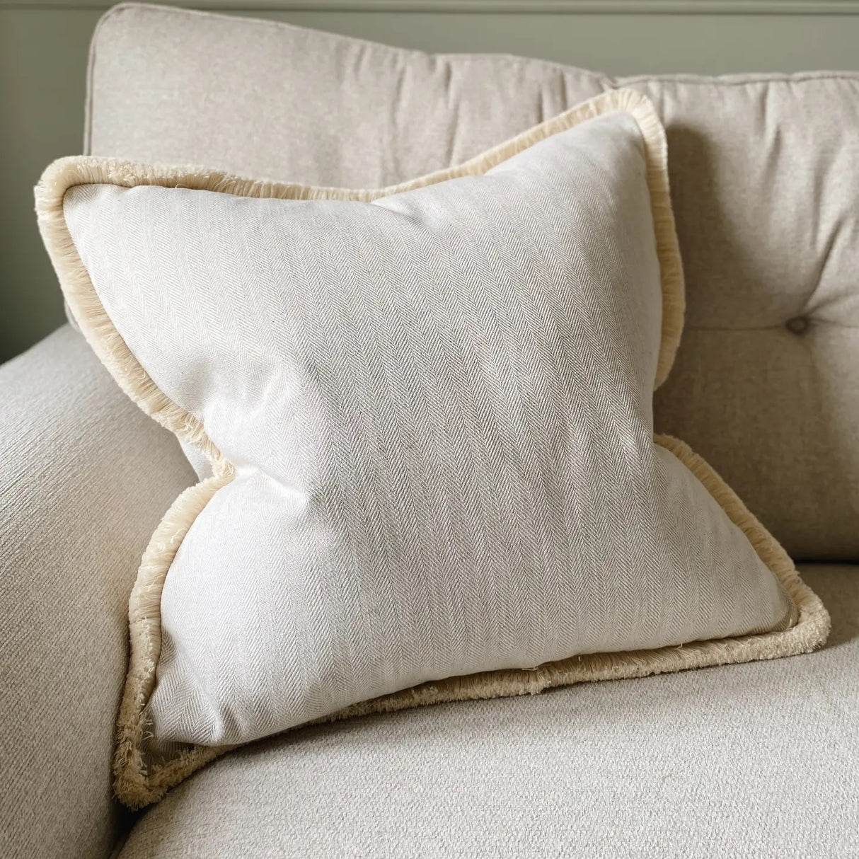 The Harriet Cream Neutral Herringbone Fringed Cushion