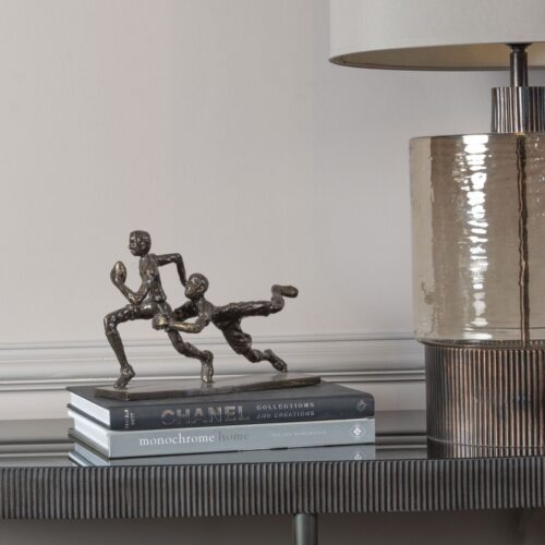 bronze rugby sculpture