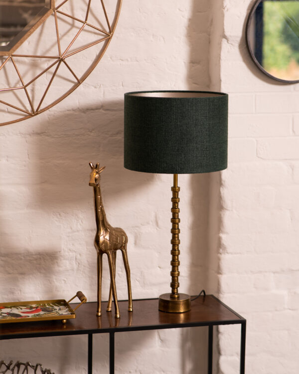 tall gold lamp with green shade