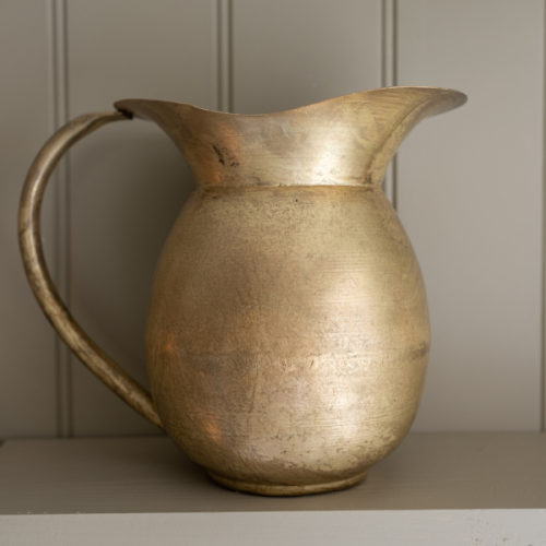 brass water jug for display